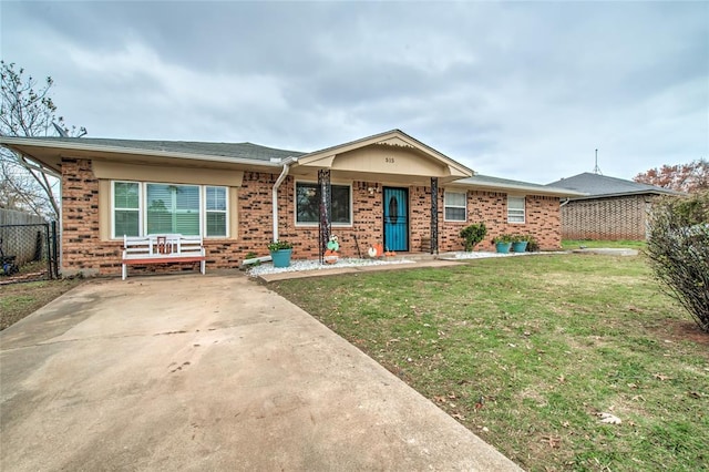 ranch-style house with a front yard