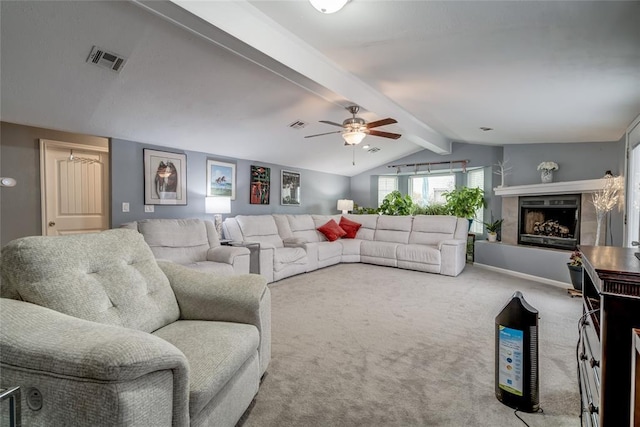 living room with ceiling fan, carpet, and lofted ceiling with beams