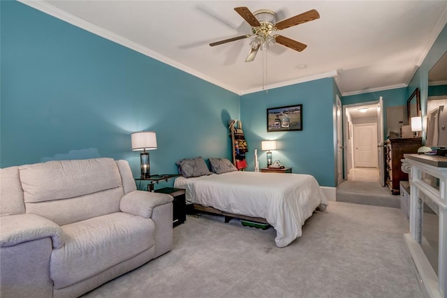 bedroom with light carpet, ceiling fan, and ornamental molding