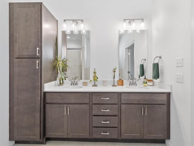 bathroom with vanity and tile patterned floors