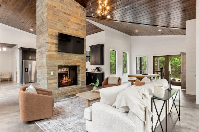 living room featuring a notable chandelier, wood ceiling, and high vaulted ceiling