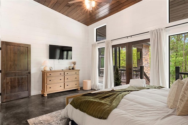 bedroom with ceiling fan, access to exterior, wood ceiling, and high vaulted ceiling