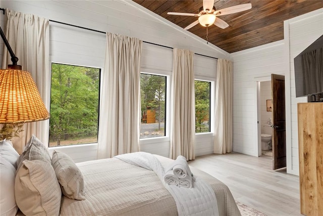 bedroom with wooden ceiling, multiple windows, lofted ceiling, and light hardwood / wood-style floors