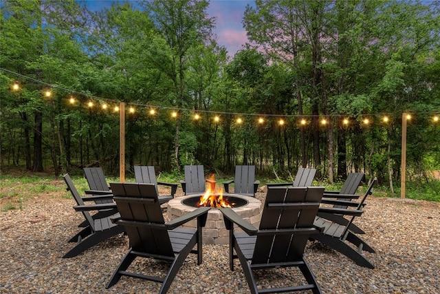 patio terrace at dusk with a fire pit