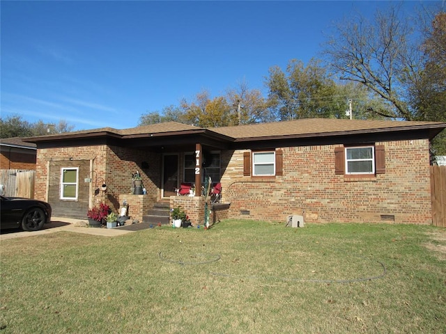 view of front of home featuring a front yard