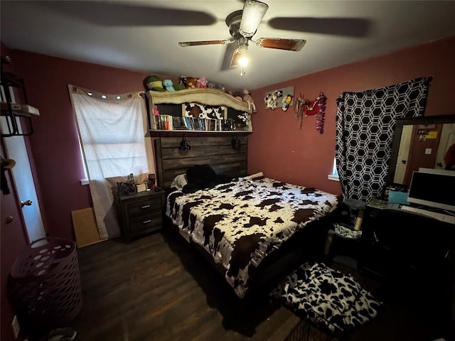 bedroom featuring hardwood / wood-style flooring and ceiling fan