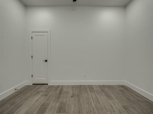 unfurnished room featuring light hardwood / wood-style floors