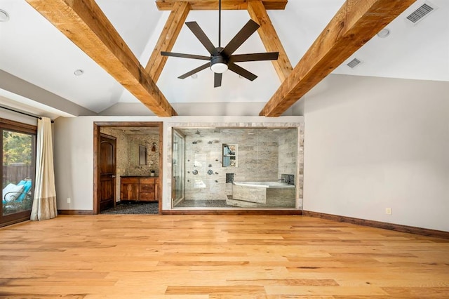 unfurnished living room with light wood-type flooring, vaulted ceiling with beams, and ceiling fan