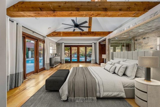 bedroom featuring light hardwood / wood-style flooring, access to outside, french doors, and vaulted ceiling with beams