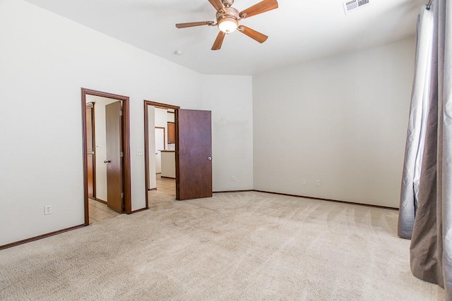 unfurnished bedroom featuring ceiling fan, carpet floors, and visible vents