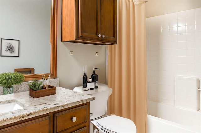 bathroom featuring toilet, shower / bath combo, and vanity