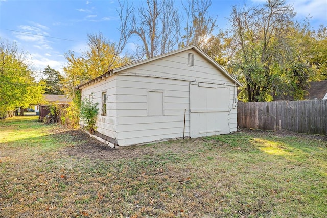 907 S Wilson Ave, El Reno, OK 73036 - view of outbuilding with a lawn