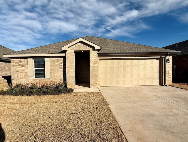 ranch-style home featuring a garage