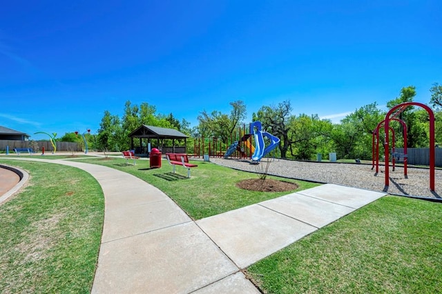 view of play area featuring a gazebo and a lawn