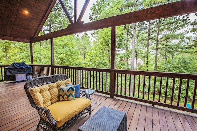 wooden deck with grilling area