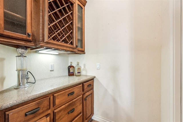 kitchen with light stone countertops