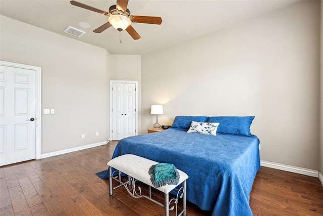 bedroom featuring ceiling fan and dark hardwood / wood-style flooring