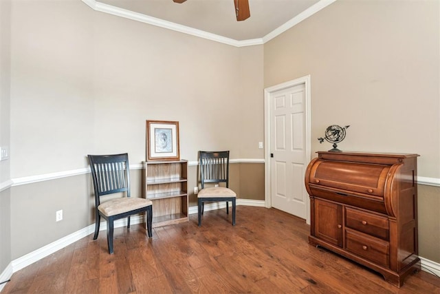 living area featuring ceiling fan, ornamental molding, and hardwood / wood-style flooring