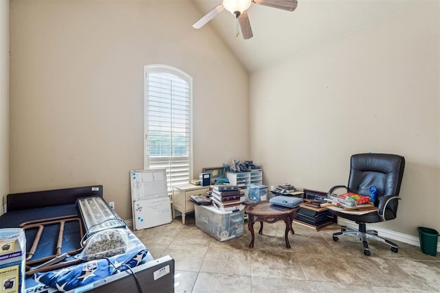 tiled bedroom featuring ceiling fan and lofted ceiling