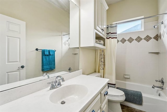 full bathroom with tile patterned flooring, vanity, toilet, and shower / bathtub combination with curtain