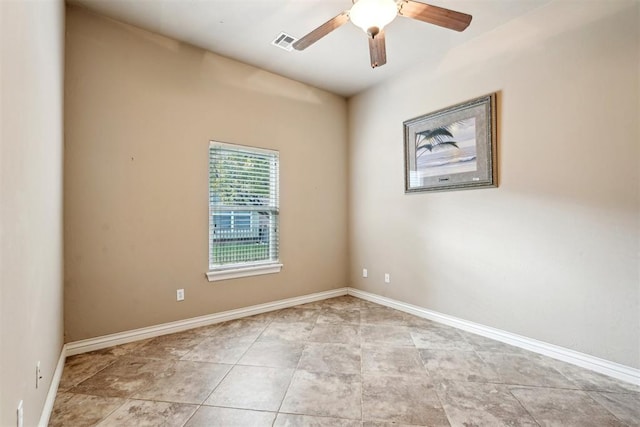 spare room with ceiling fan