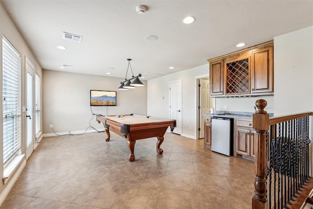 recreation room featuring bar area and billiards