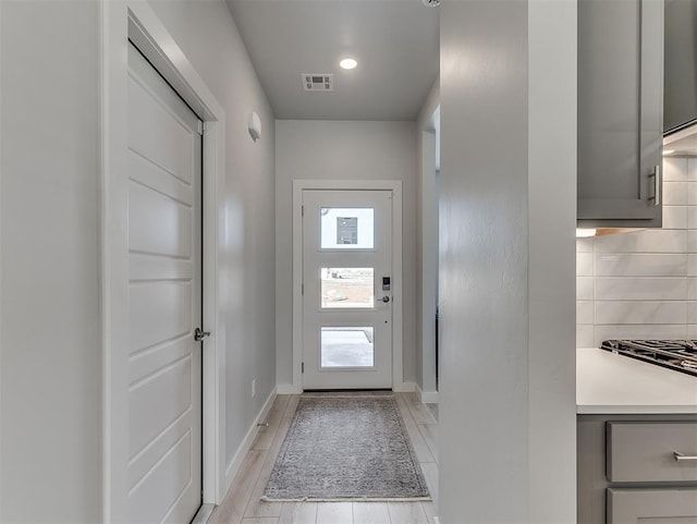 doorway featuring light wood-type flooring