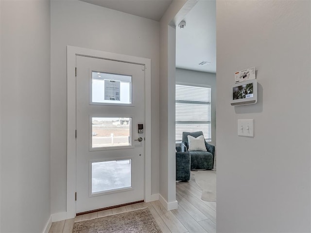 doorway featuring light hardwood / wood-style floors