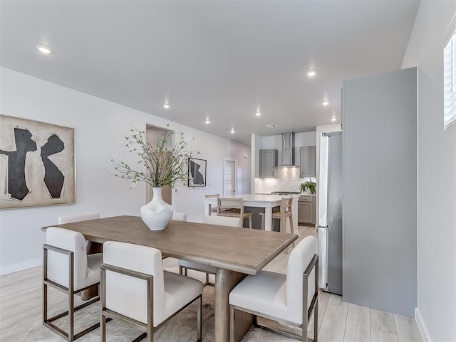 dining room with light hardwood / wood-style flooring