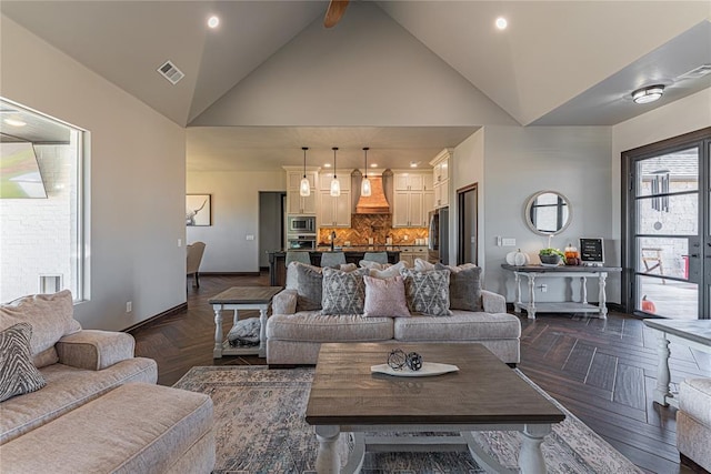 2063 County Road 1336, Blanchard, OK 73010 - living room featuring baseboards and high vaulted ceiling