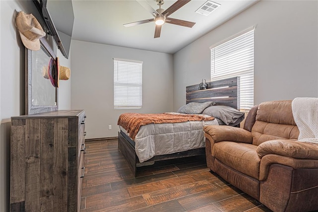 2063 County Road 1336, Blanchard, OK 73010 - bedroom featuring ceiling fan and dark wood-style flooring