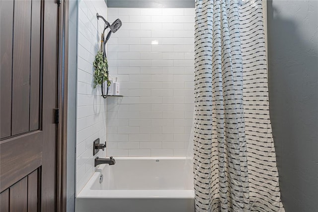 2063 County Road 1336, Blanchard, OK 73010 - bathroom featuring shower / bath combo with shower curtain and a textured wall