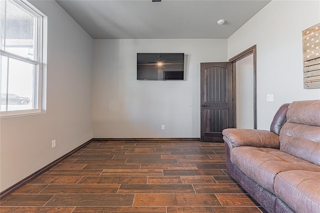 2063 County Road 1336, Blanchard, OK 73010 - living area featuring dark wood-style floors and plenty of natural light