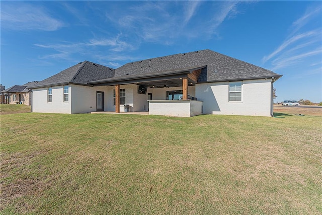 2063 County Road 1336, Blanchard, OK 73010 - rear view of house featuring a patio area, brick siding, and a lawn