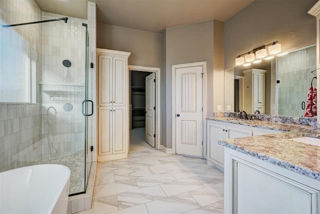 bathroom featuring vanity and plus walk in shower