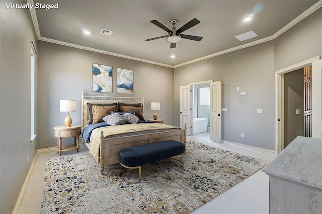 carpeted bedroom with ceiling fan and ornamental molding