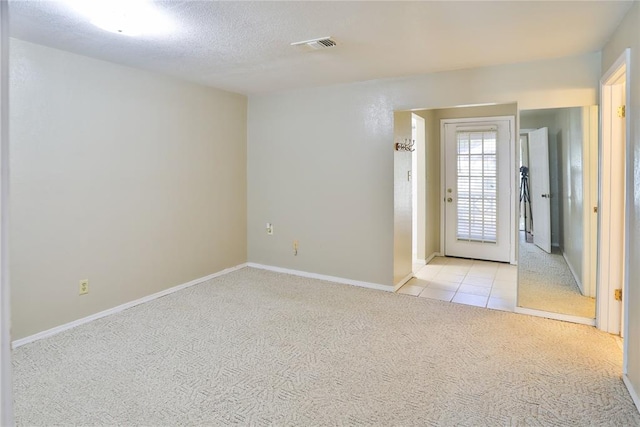 interior space with a textured ceiling