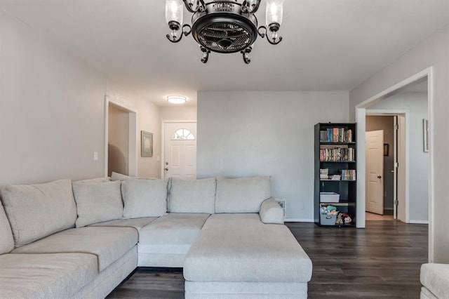 living room with dark hardwood / wood-style flooring