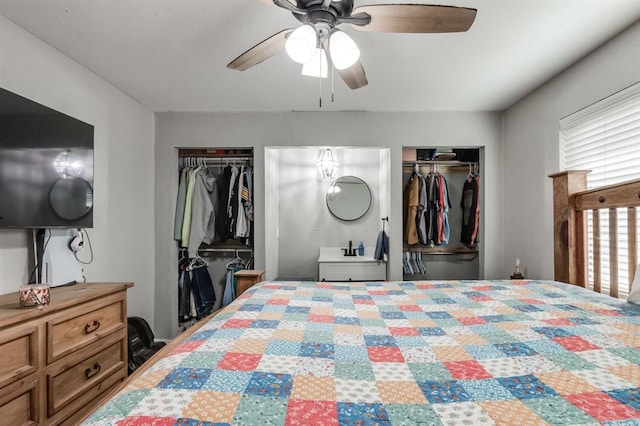 bedroom featuring ceiling fan and two closets