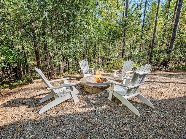 view of patio / terrace featuring an outdoor fire pit