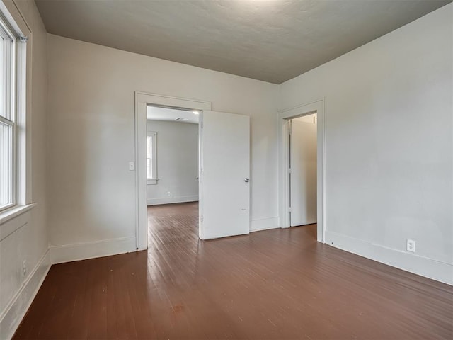 empty room featuring hardwood / wood-style flooring