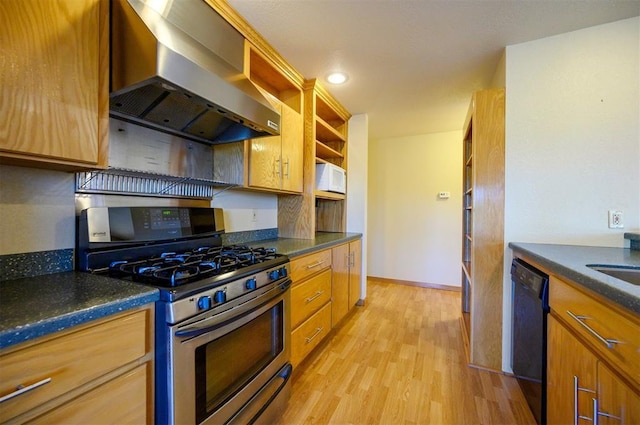 kitchen with gas range, black dishwasher, light hardwood / wood-style flooring, and wall chimney exhaust hood