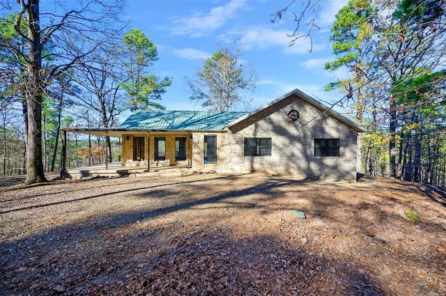 rear view of property featuring a patio