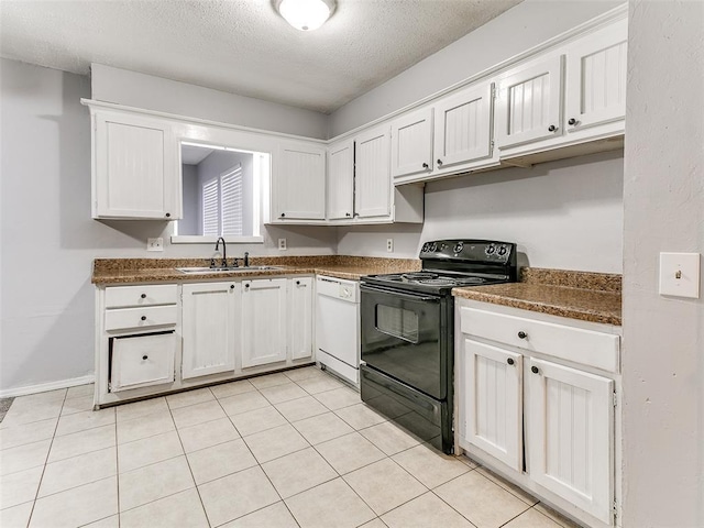 kitchen featuring white dishwasher, white cabinets, sink, black electric range, and a textured ceiling