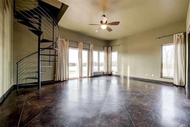 empty room featuring ceiling fan