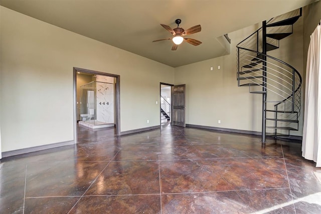 unfurnished room with ceiling fan