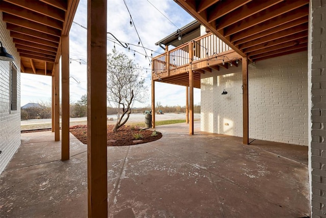 view of patio with a deck