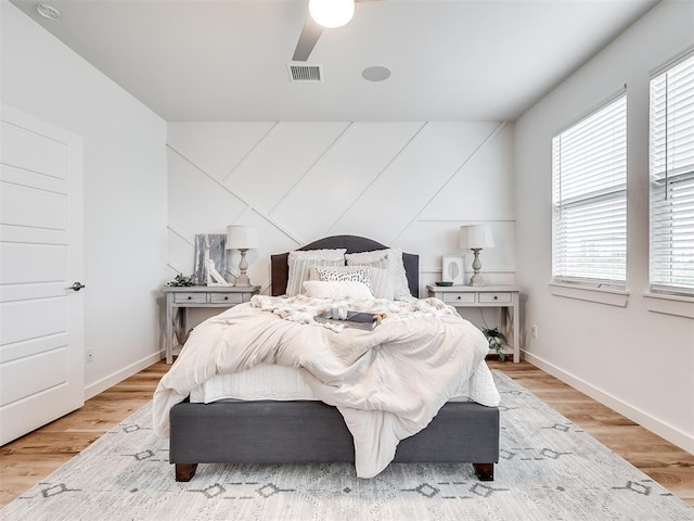 bedroom featuring ceiling fan and wood-type flooring