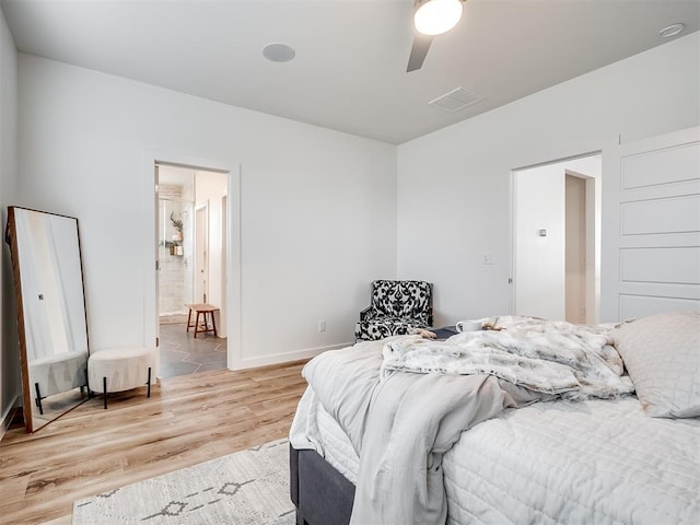 bedroom featuring ceiling fan and light hardwood / wood-style floors