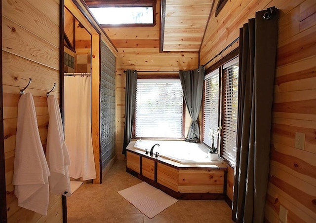 bathroom with lofted ceiling, a tub to relax in, and wooden walls